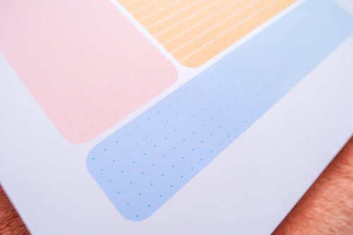A close up of the clean pastel features on Totepad's Cornell Notes Bubblegum Cute Notepad.