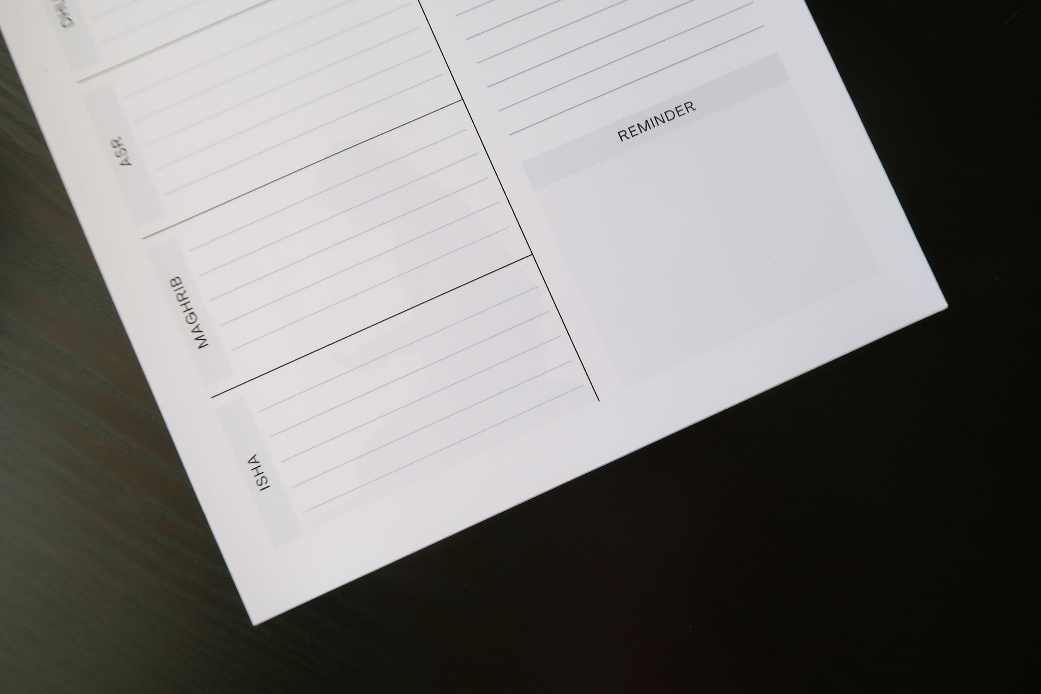 Another close up of Totepad's Luxury Daily Planner Notepad, showcasing the reminders and the daily notes.