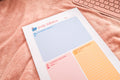 Totepad's Bubblegum Daily Reflection Notepad on a warm fuzzy pink blanket.